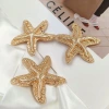 Factory direct sales, high-end vacation fragrance, ocean-style alloy starfish, irregular-shaped fashionable swimsuits, decorative buttons, handicrafts, gifts, creative conch shells, coral details Picture
